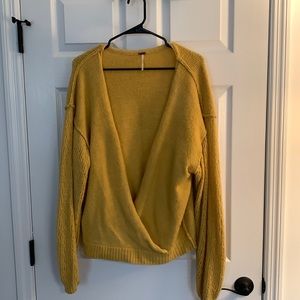 Woman’s free people sweater size M gold / yellow in color